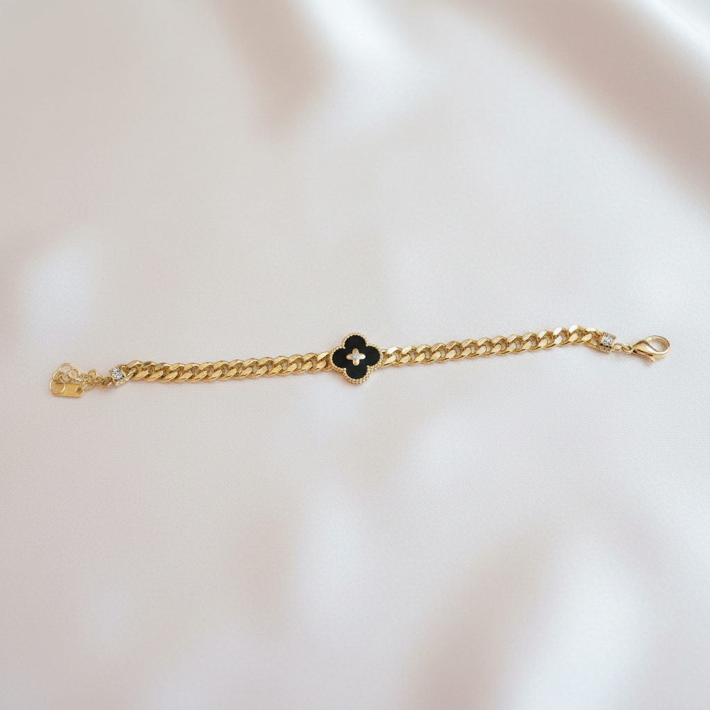 Black Clover Cross Flat Lay