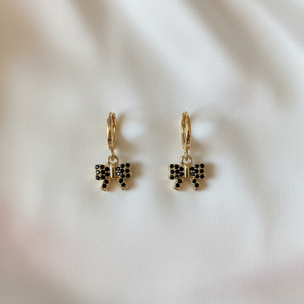 Black CZ Bow Hoops Flat Lay