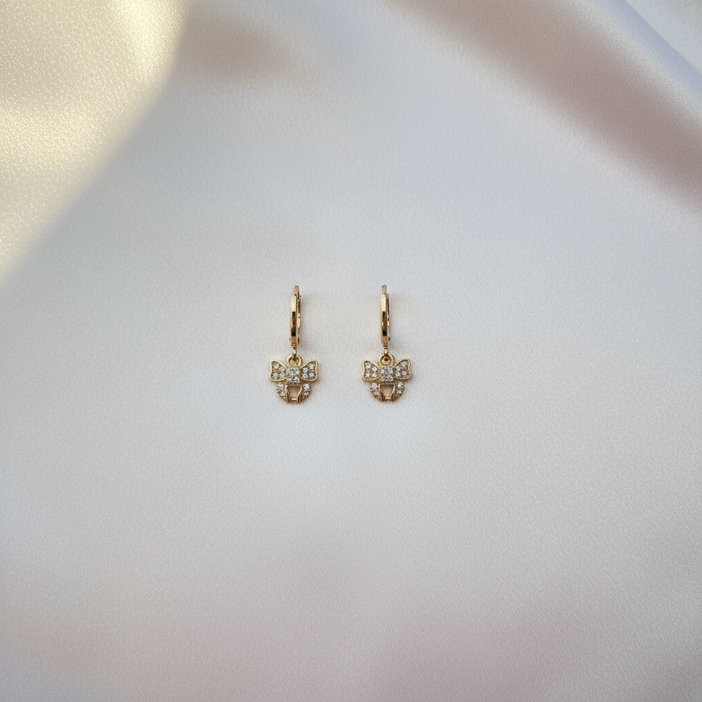 Crystal Bow Charm Hoops Flat Lay