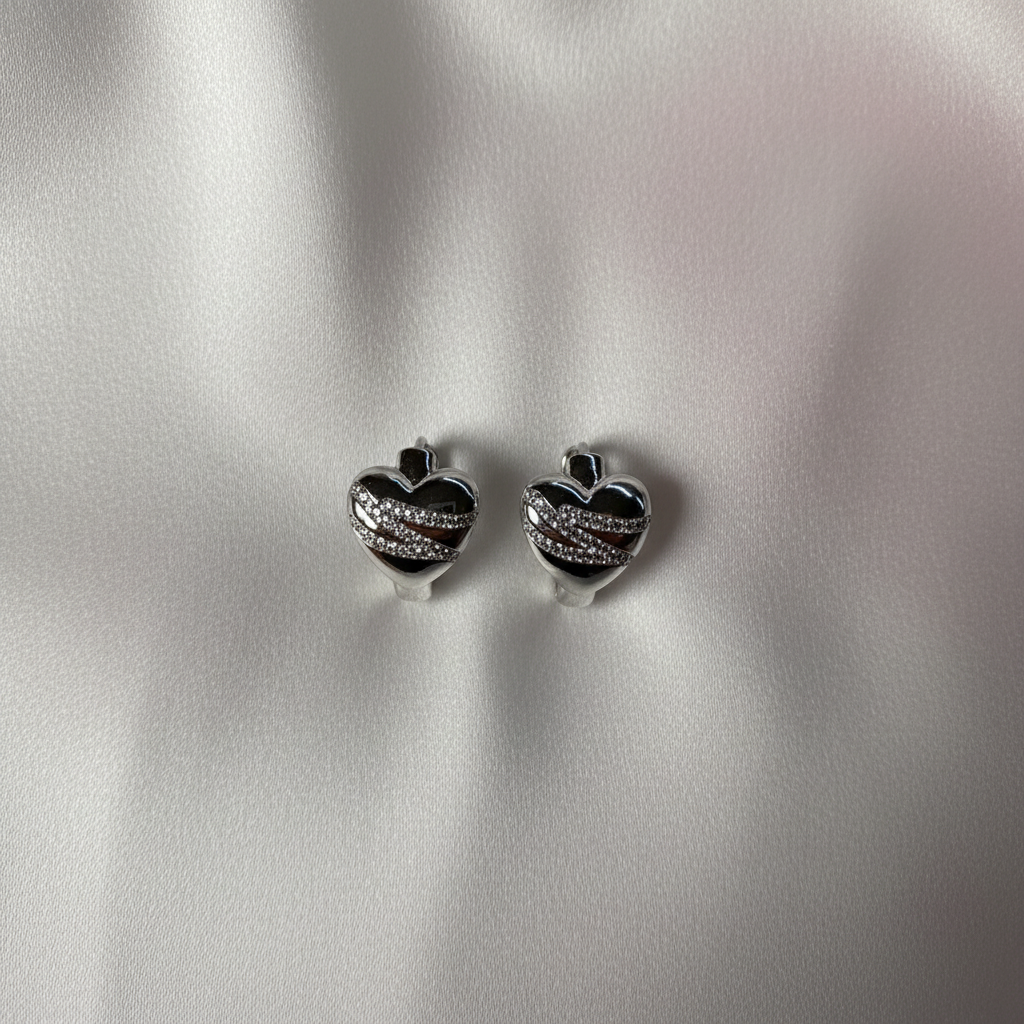 Double Heart Huggie Earrings Flat Lay