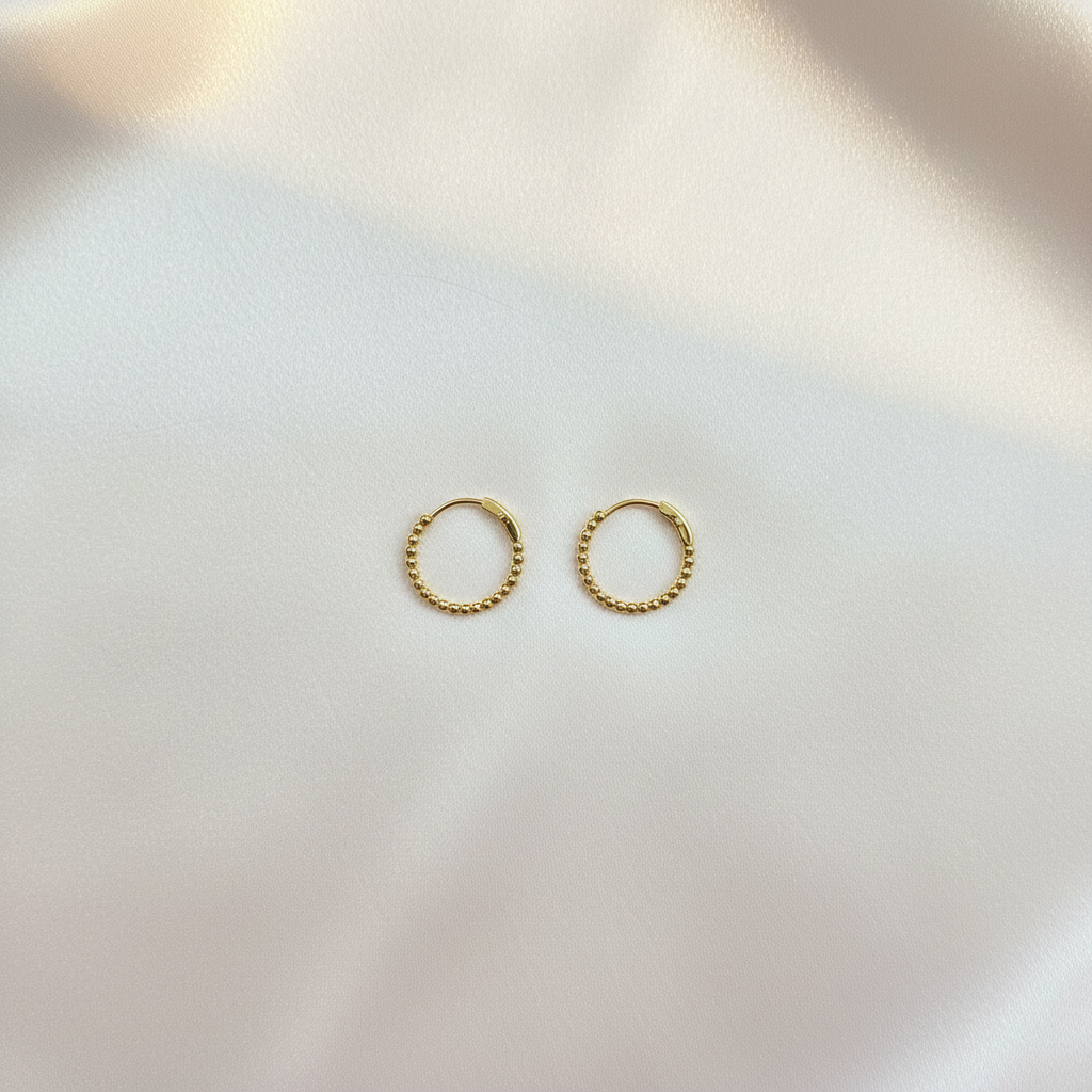 Gold Beaded Huggie Hoop Earrings Flat Lay
