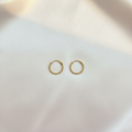 Gold Beaded Huggie Hoop Earrings Flat Lay