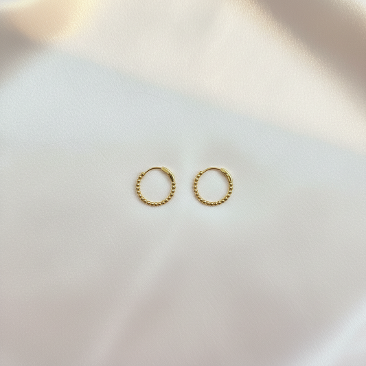 Gold Beaded Huggie Hoop Earrings Flat Lay
