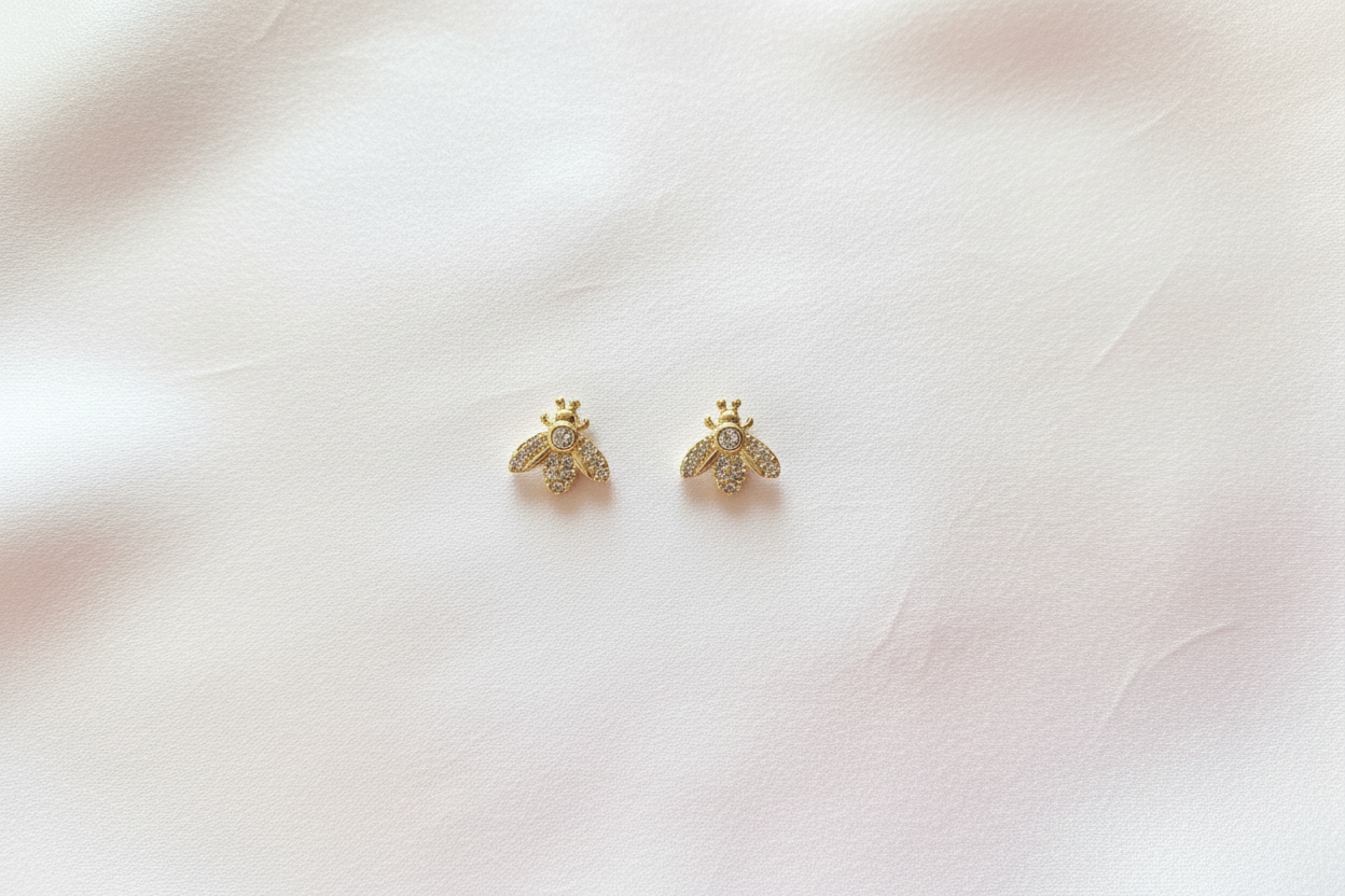 Gold Bee Stud Earrings Flat Lay