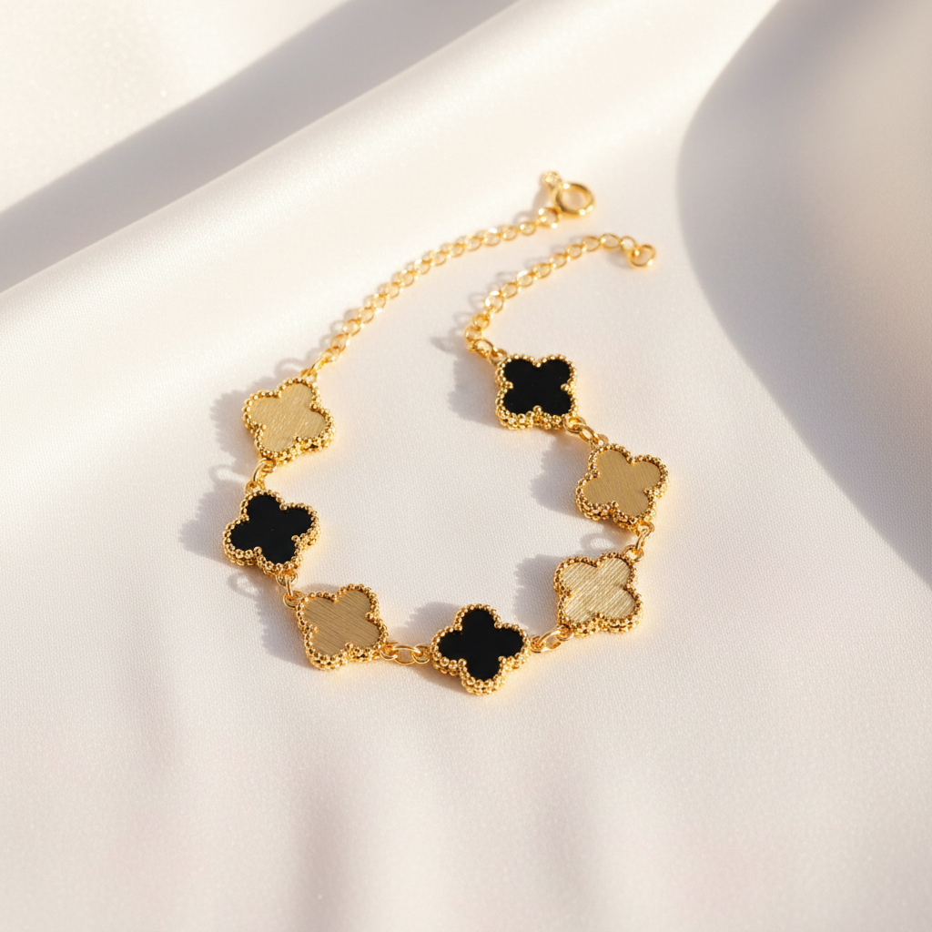 Gold Black Clover Bracelet Flat Lay