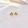 Gold Bow Earrings Flat Lay