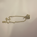 Gold Crown Necklace Flat Lay