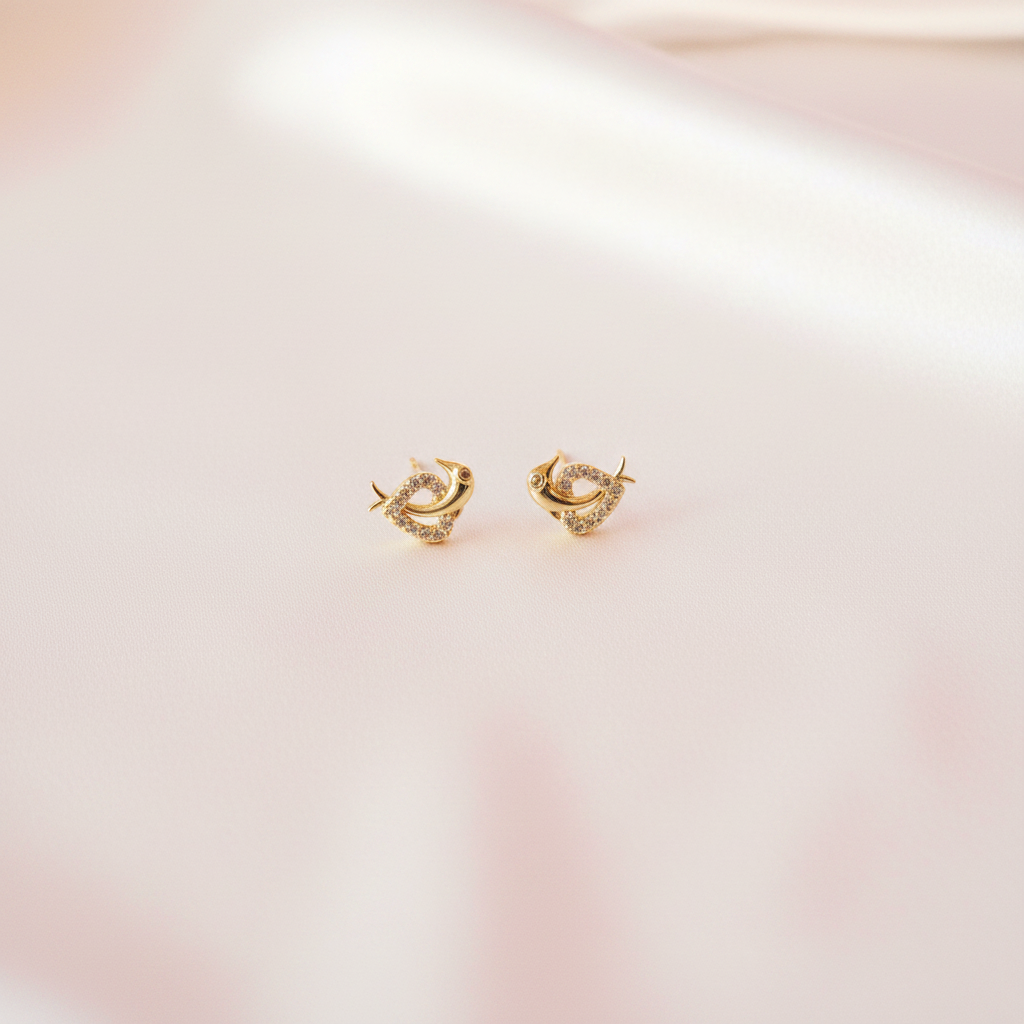 Gold Dolphin Heart Stud Earrings Flat Lay