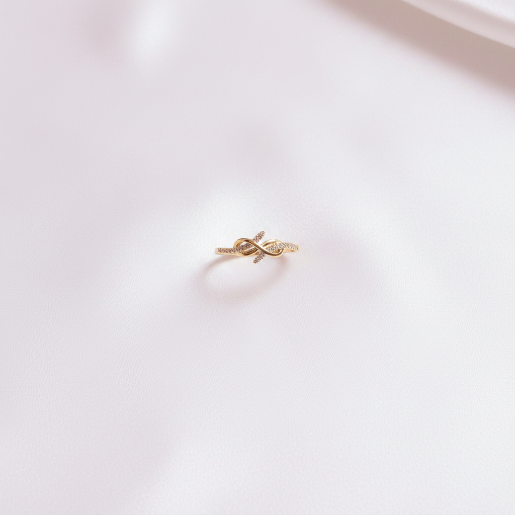 Gold Infinity Knot Ring Flat Lay