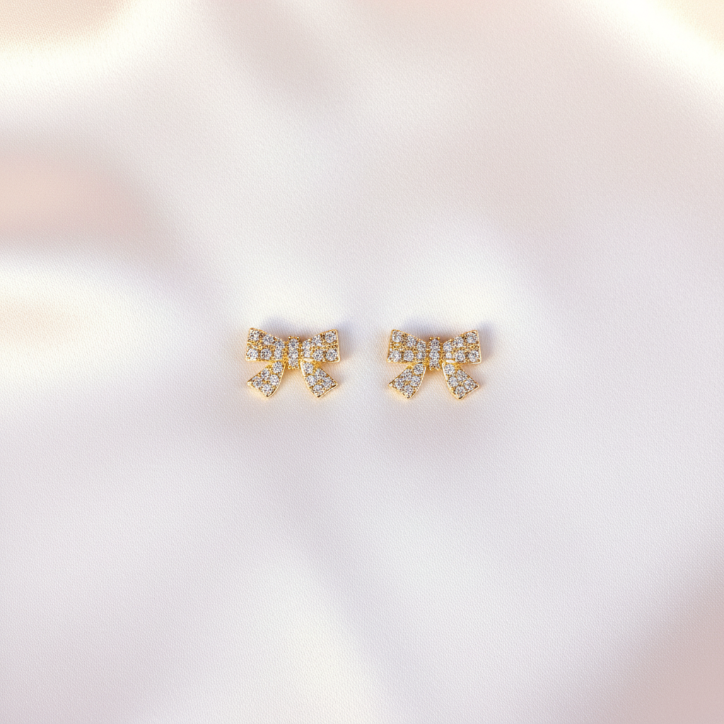 Iced-Out Bow Studs Flat Lay