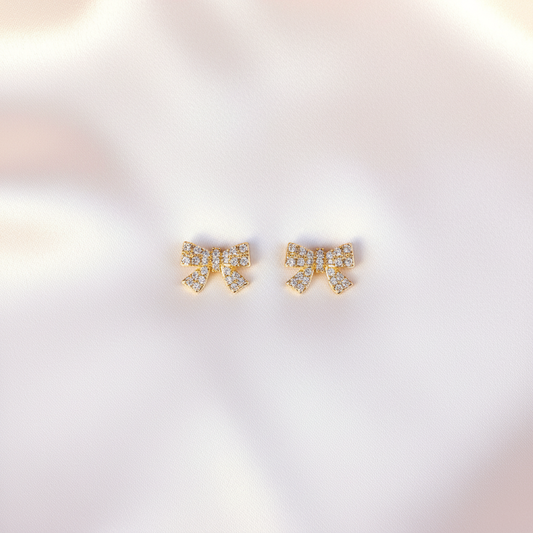 Iced-Out Bow Studs Flat Lay