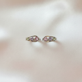 Multicolor Crystal Huggie Earrings Pair Flat Lay