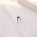Ruby Red Halo Ring Flat Lay